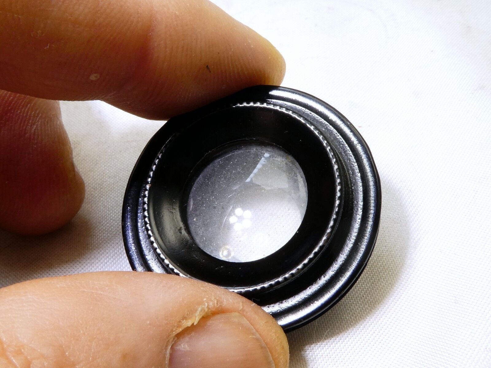 Rear lens filter with metal ring