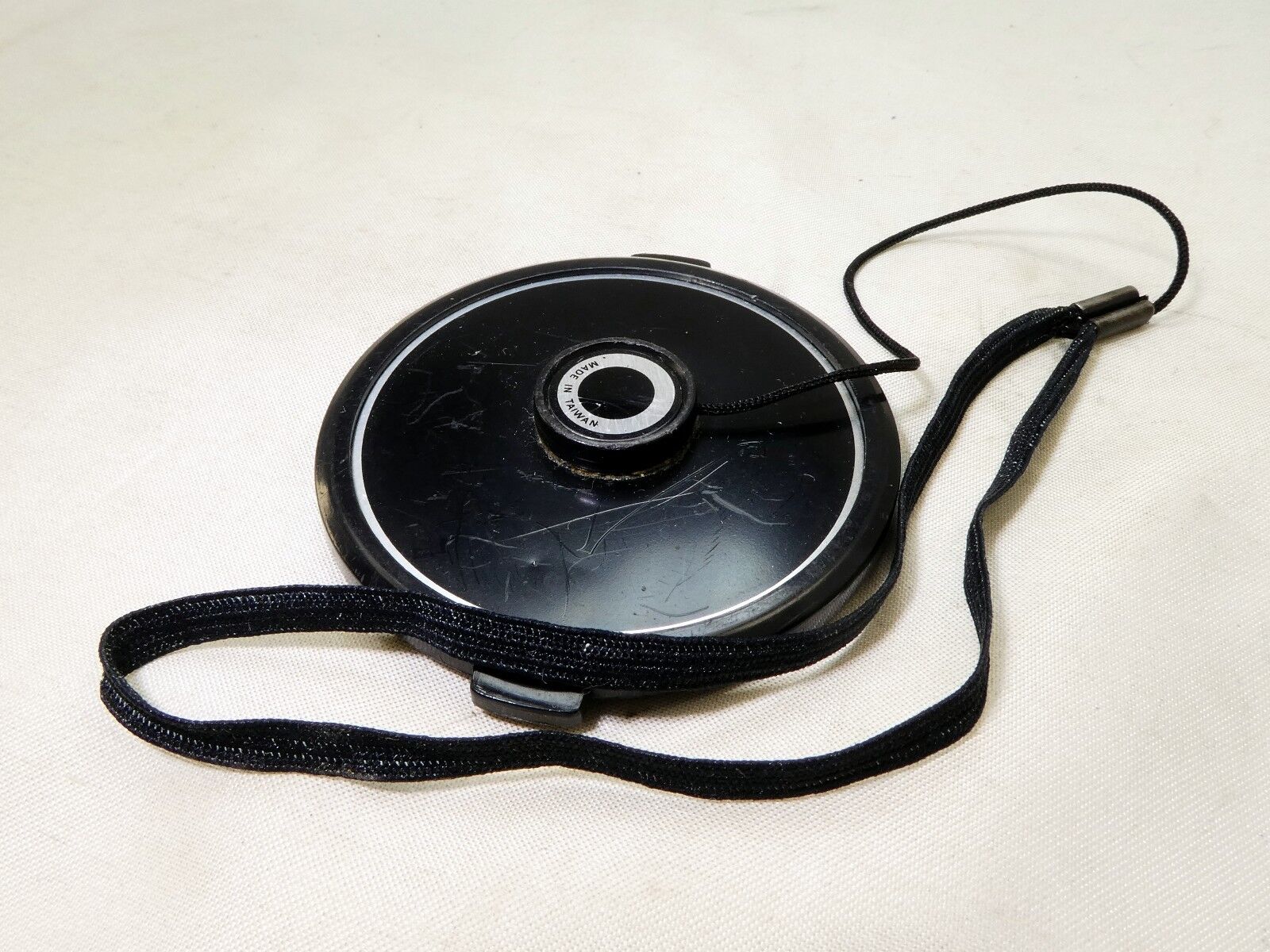 Black 55mm Lens front Cap  Snap on type with keeper string holder